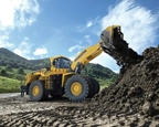 New Wheel Loader dropping dirt,New Komatsu Wheel Loader under dusk sky